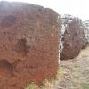 Red pukao (topknots) originally worn by moai at Tongariki