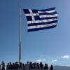 The Greek flag flying from the Acropolis