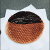 Freshly made stroopwafel - this is a famous dessert in Amsterdam 