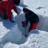 Getting below the snow to drill an ice core