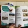 The inside text and photos of the journal in Khmer