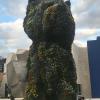This statue is called "The Puppy." It is full of flowers! I don't know how they manage to keep all of them from falling.