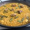 Pronounced (pah-eh-yah) is a hearty rice dish served with seafood, chicken or vegetables