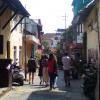 You can see me in red, walking through a street in Kochi, Kerala