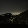 The view from our temple in the mountains where you can see the city lights