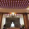 Light is the theme of this Buddha Hole so lanterns and bright lines hang everywhere