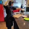 Our instructor, Sophia, shows us just how long these noodles can get. 
