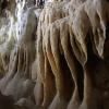 Ribbons like these form as slow dripping water hardens into calcite over thousands of years.