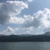 This is a picture I took from a boat in the water that was shown in the last photo. The rock on the right is the "Rock of Peñol." Do you see the helicopter?