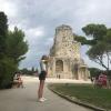 A touristy photo of me in front of the Tour of Magne, pretending to climb it!
