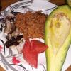Fresh grilled fish with jollof rice, avocado and watermelon! This has become our favorite meal here in Ghana.