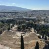 View from the Acropolis of an ancient theater and the Acropolis Museum