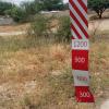 A flood marker in the Klein Windhoek river, which is completely dry due to the drought