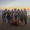 Friends on the beach at sunset in Puerto Escondido
