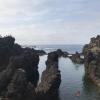 A natural swimming pool filled with ocean water in Porto Moniz, Madeira