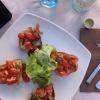 "Bruschetta al pomodoro", my favorite starter at Italian restaurants-- just pieces of bread toasted with olive oil and topped with diced tomatoes, basil and salt! 
