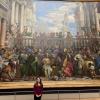 Across from "The Mona Lisa", there was a painting called "The Wedding Feast at Cana"... it was extraordinary to see the contrast in size!