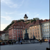 Graz's main square is filled with colorful buildings and great views of the Uhrturm
