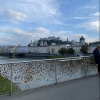 A famous bridge over the river Salzach, found in Salzburg, with lots of locks hanging on the railings
