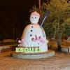 The Esquel snowman statue is repainted for different seasons and holidays; here he has flowers for spring!