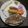 A common meal in the Amazon with yuca, plantain, carrots, onion, rice and fish