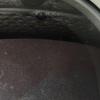 Bacteria growing on the anode disk in the reactor give the black disk a red tinge. Gas produced via electrolysis and by the bacteria floats to the top of the reactor and collects in pipes that connect to the gas trap and gas clock