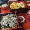 A Japanese lunch set served with soba, tempura or deep fried veggies, miso soup and other side dishes 