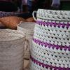 Handwoven baskets; the handicrafts are woven using two different kinds of palm leaf, a stronger one is used on the outside, while a softer, more flexible version is used on the inside