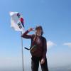 Victory snapshot at the windy peak! 