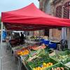 Krista: Fresh veggies for sale at a farmers market