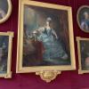 A painting within Versailles of Marie Antoinette - a prominent figure within the French elite, targeted during the French Revolution 