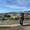 I am posing at the highest point in Monte Alban