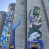 These huge towers, called silos, used to store grain and wheat, and are about 100 feet tall! 