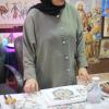 A woman demonstrating the creation of mosaics, the ancient art form the city of Madaba is famous for