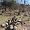 Several 돌탑 (dol-tap), stone stacks built near temples to ward off bad spirits or make wishes come true