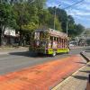 This is a chiva, a traditional bus used to transport fruits and vegetables. They have beautiful designs!