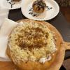 We will enjoy dinner at a traditional Hungarian restaurant serving lángos, a favorite Hungarian street food!