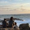 We found a beautiful spot full of rocks and we decided to sit down here and wait to watch the sunset.