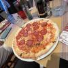 This is a diavola Pizza made in Venice. This pizza has spicy salami and fresh mozzarella and in Italy you eat pizza with a fork and a knife!!! 