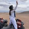 Riding an ATV through the desert