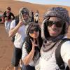 With my friends and in the middle of the desert