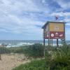 A little lifeguard stand where the off duty lifeguards can hang out until it is their turn to patrol the beach