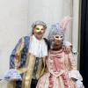 This venetian couple stood in front of the opera house dressed in the traditional french inspired carnival costumes. 