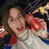 Me with an awesome laser printed Coca-Cola can from the Olympic torch relay event, it has my picture on it! 