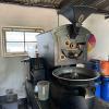 The coffee roaster: where green beans turn fragrant and brown.