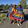 My coworkers and I wearing colorful seshoeshoe dresses and hats