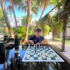 Playing chess with my friend on a trip to the capital city, Asuncion