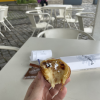 Trying a Pastel de Nata from Pastéis de Belém, one of Portugal’s most famous pastries.