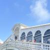 Rialto Bridge, a famous bridge with many shops along it.