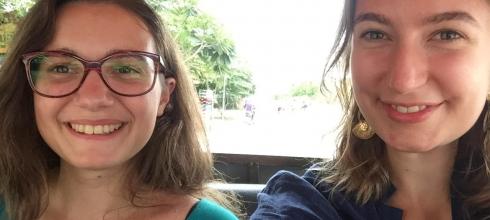 My friend Sophie and me enjoying a breezy ride in a tuk-tuk, a motorized rickshaw